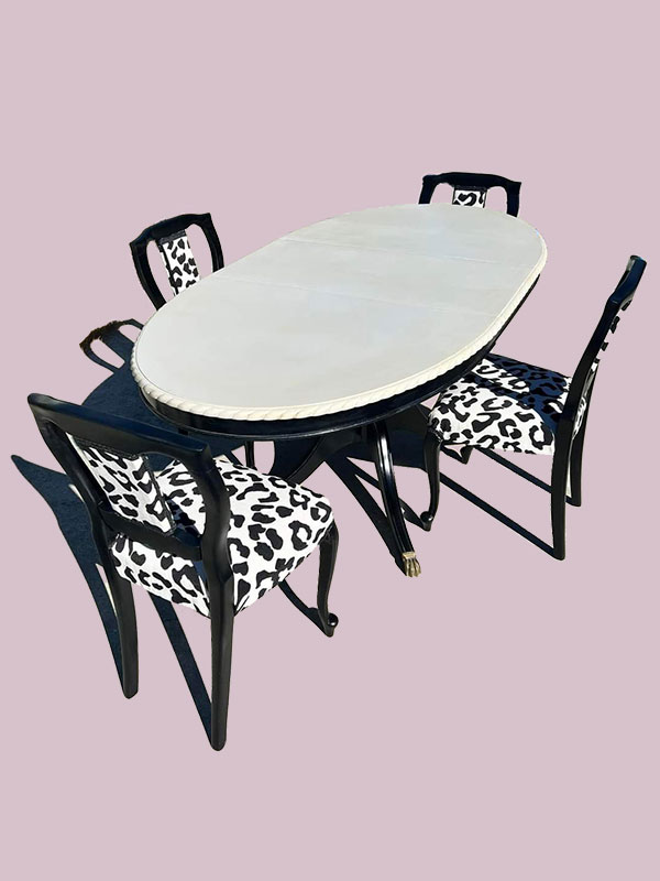 Dining Table with 4 Black and White Chairs around it